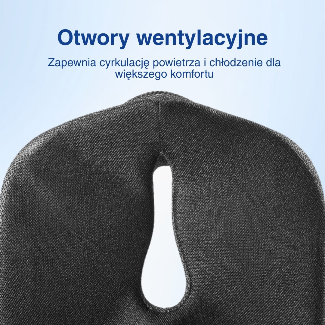 Zbliżenie poduszki z pianki memory z otworem wentylacyjnym pośrodku.